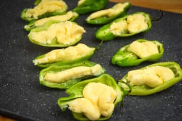 Jalapeño peppers stuffed with cheese filling.