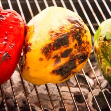 Charred peppers on the grill.