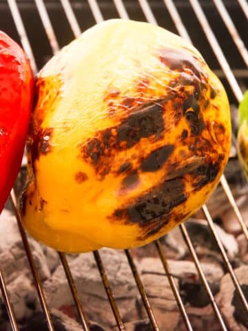 Charred peppers on the grill.