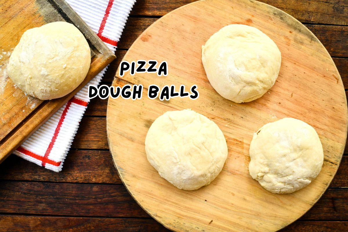 Pizza dough balls labeled on circular wooden board.