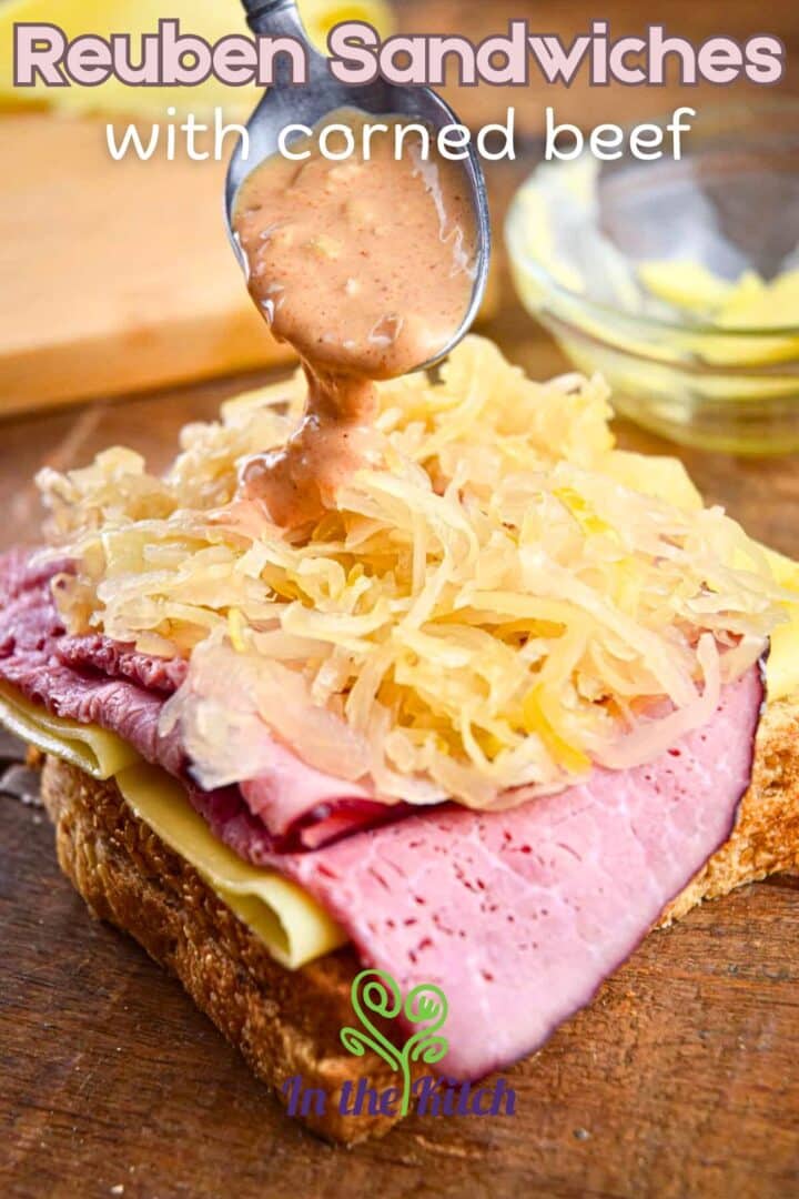 Open reuben sandwich with sauce and text overlay that says 'reuben sandwiches with corned beef'.
