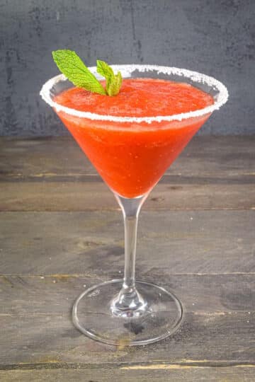 Slushy margarita in sugar-rimmed glass.