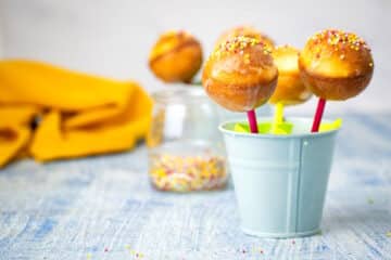 Cake mix cake pops in small, light blue, pail.