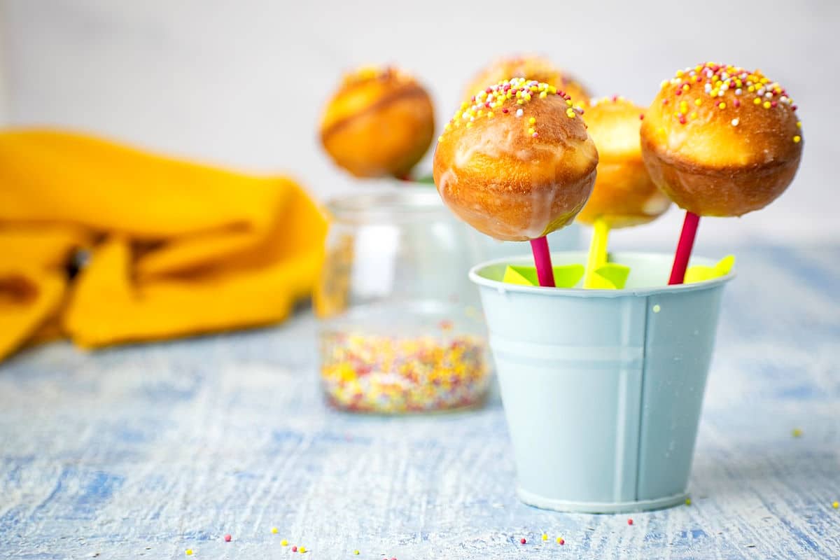 Cake mix cake pops in small, light blue, pail.