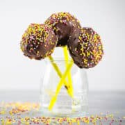 Decorated cake pops in jar.