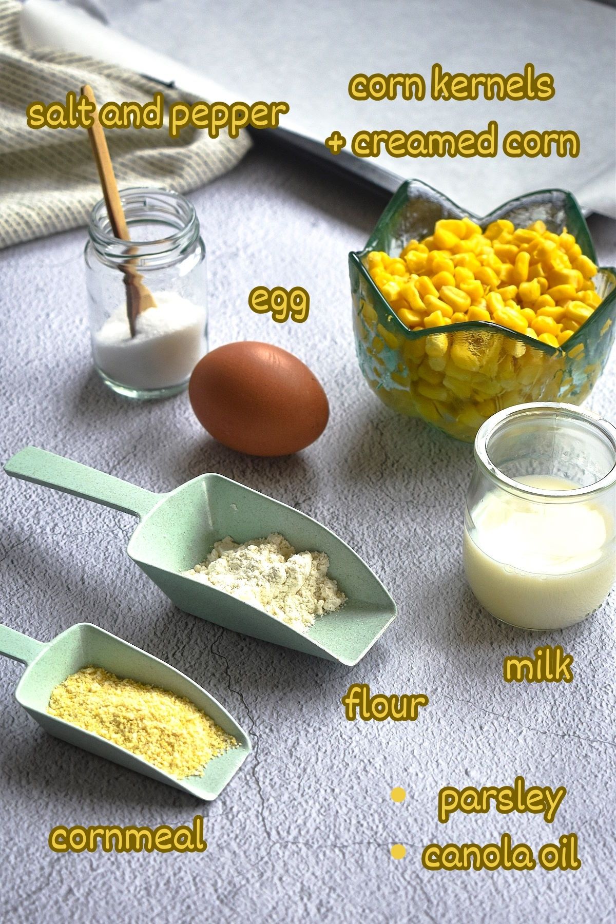Corn nuggets ingredients labeled on light grey background.