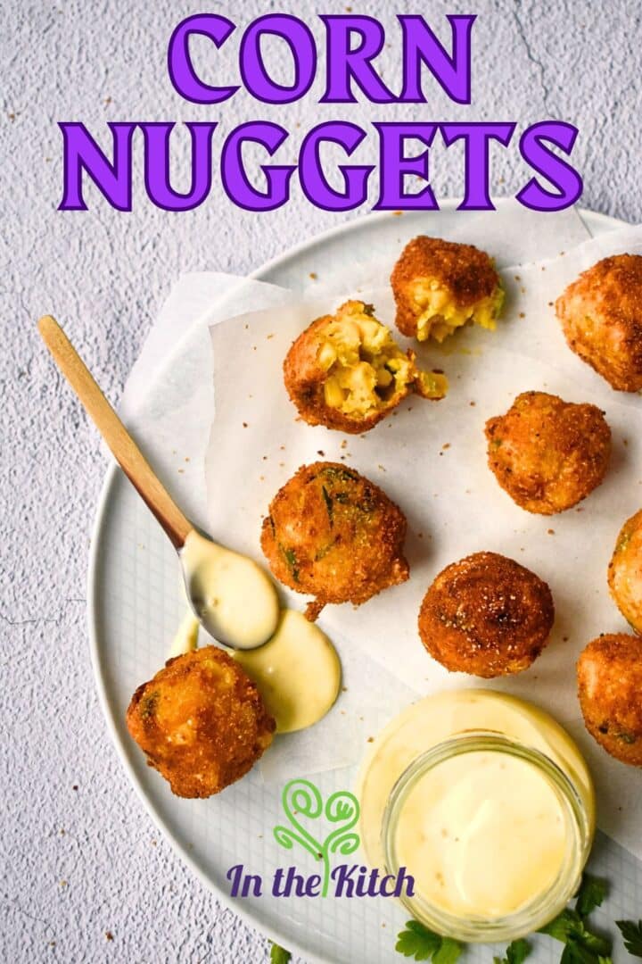 Corn nuggets on plate with dip and text overlay that says 'corn nuggets'.