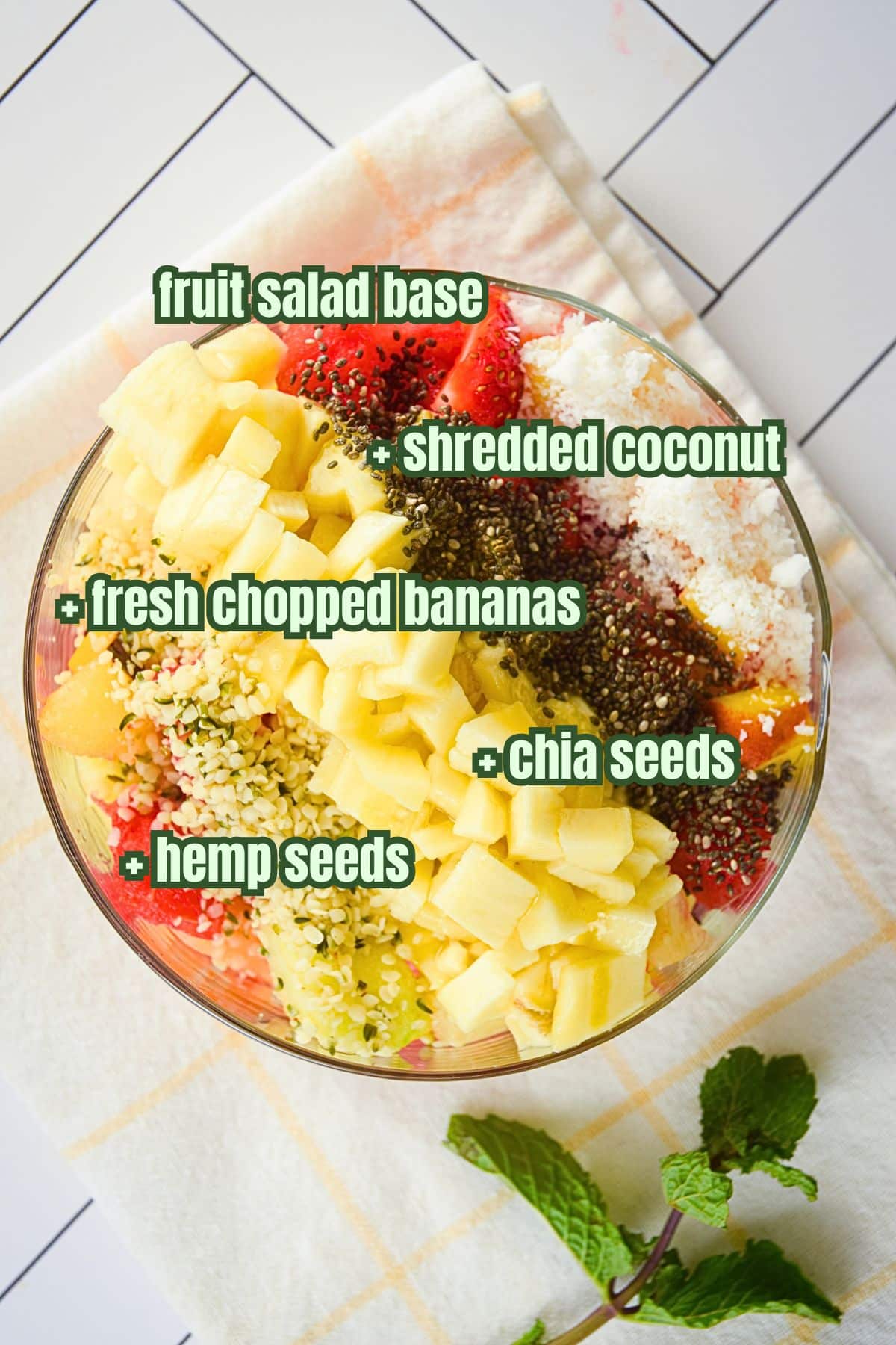 Fruit salad with banana and coconut topping.