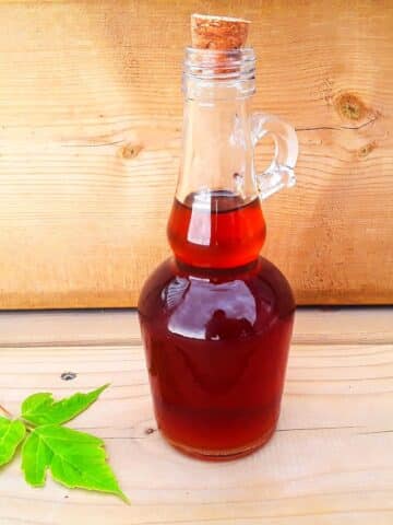 Pure maple syrup in bottle.