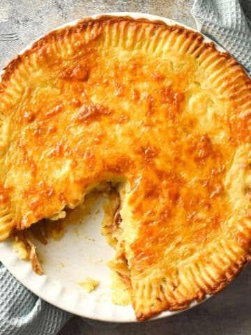 Shepherd's pie with a slice missing.