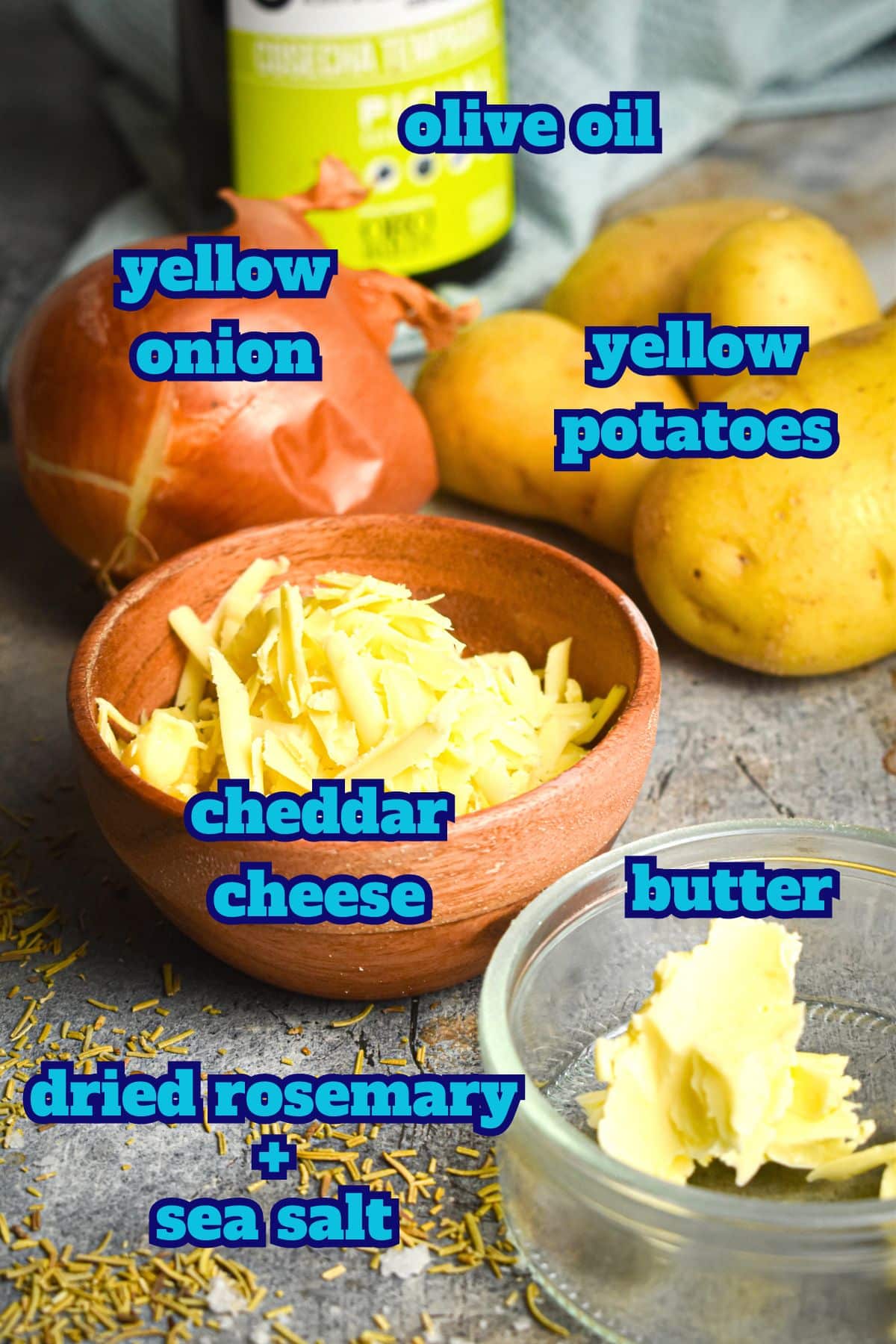 Shepherd's pie ingredients prepped on grey background.