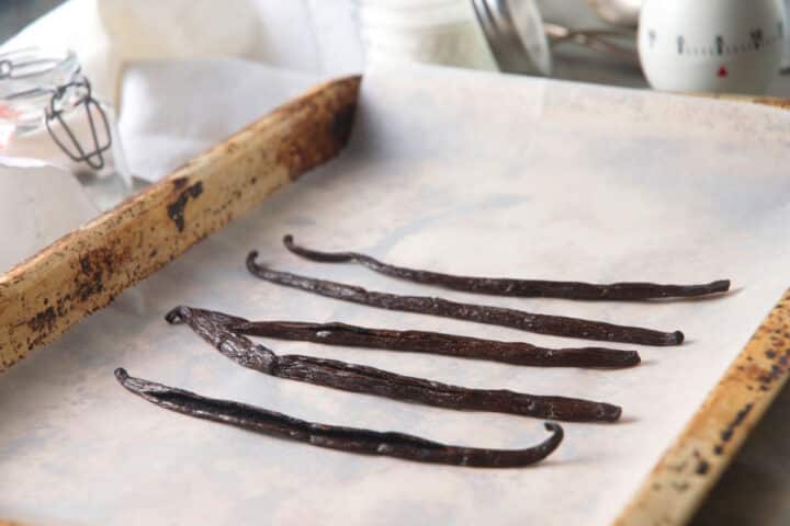 How to Make Vanilla Powder Step 4 Vanilla beans on baking sheet.