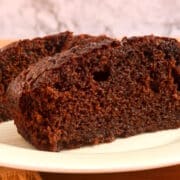 Moist chocolate cake on plate.