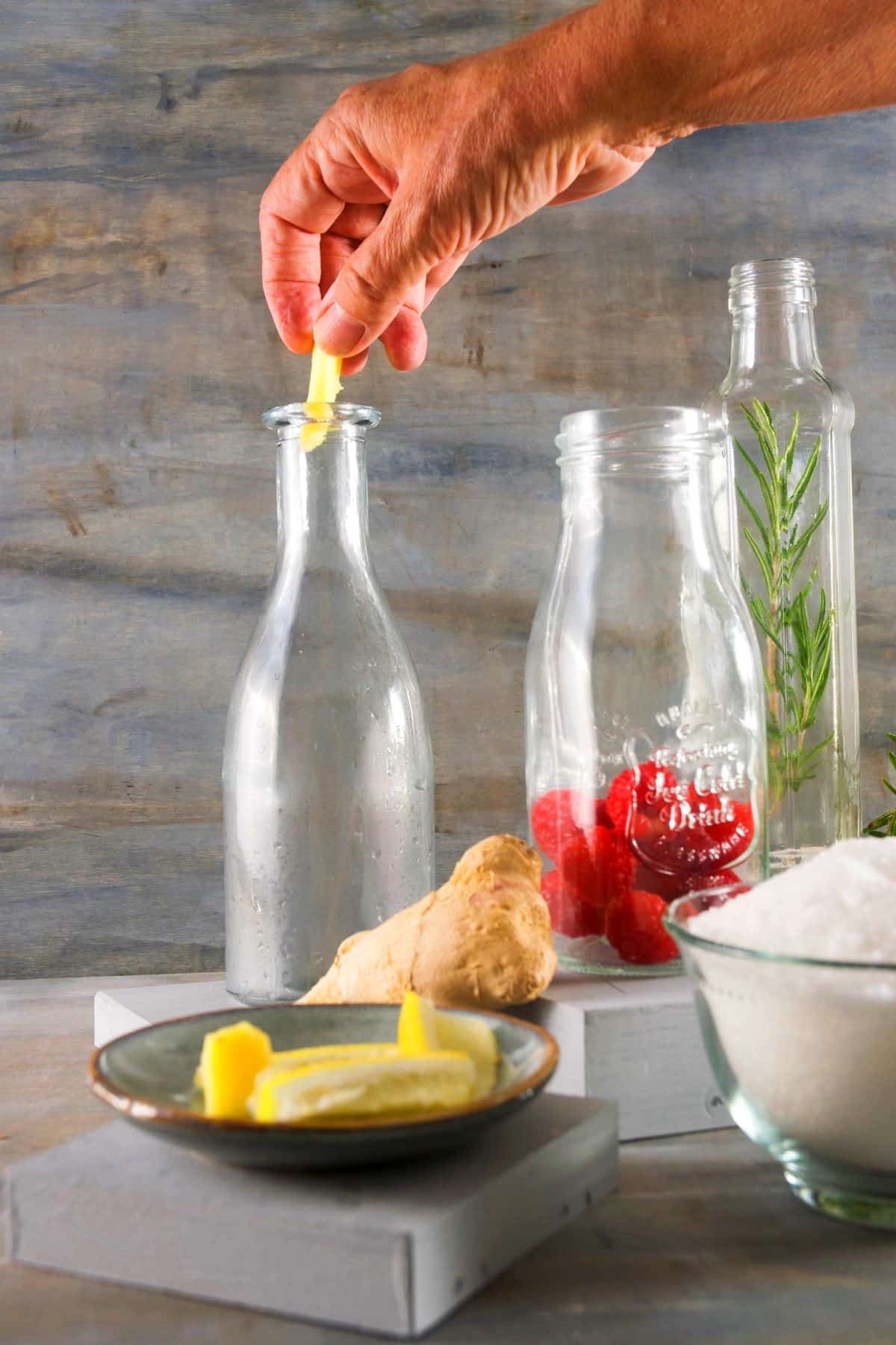 Jars with lemon-ginger, raspberry and rosemary.
