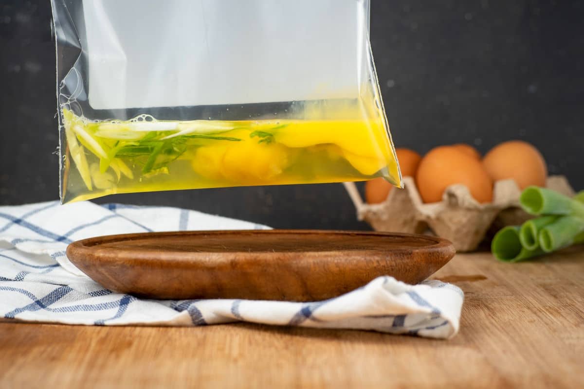 Raw egg in zip top bag.