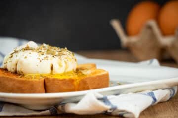 Sous vide soft-boiled egg on toast with spices.
