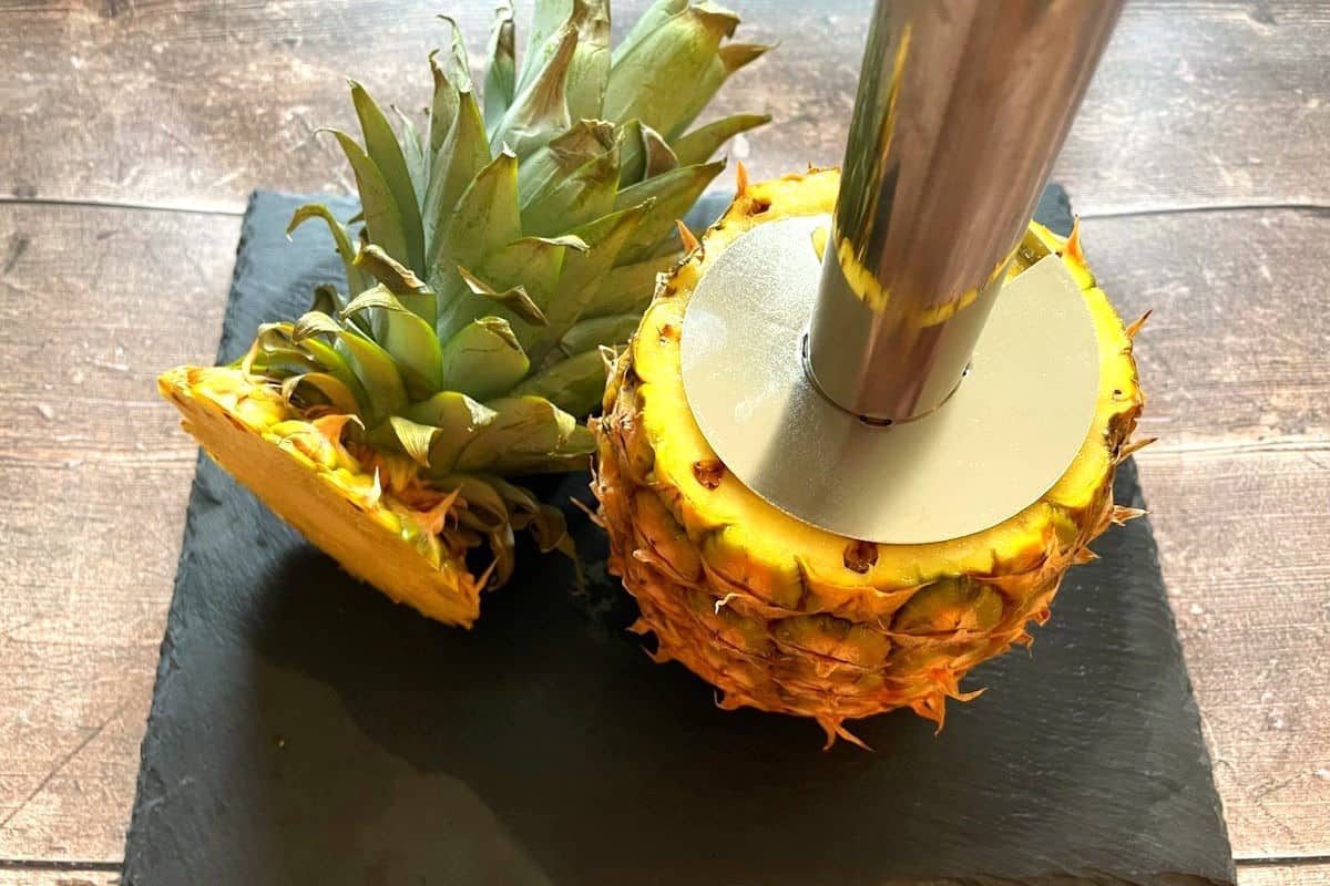 Pineapple with corer in the center.