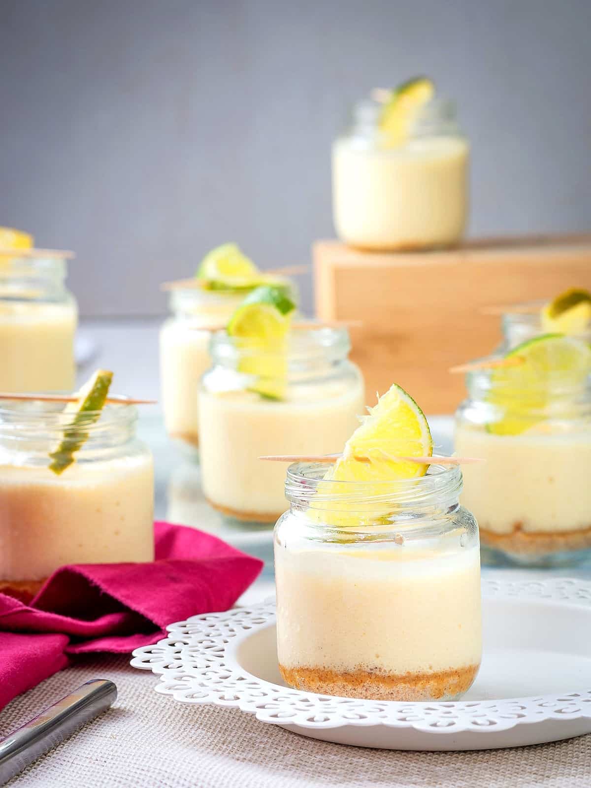Iced lemon mousse dessert in mini jars.