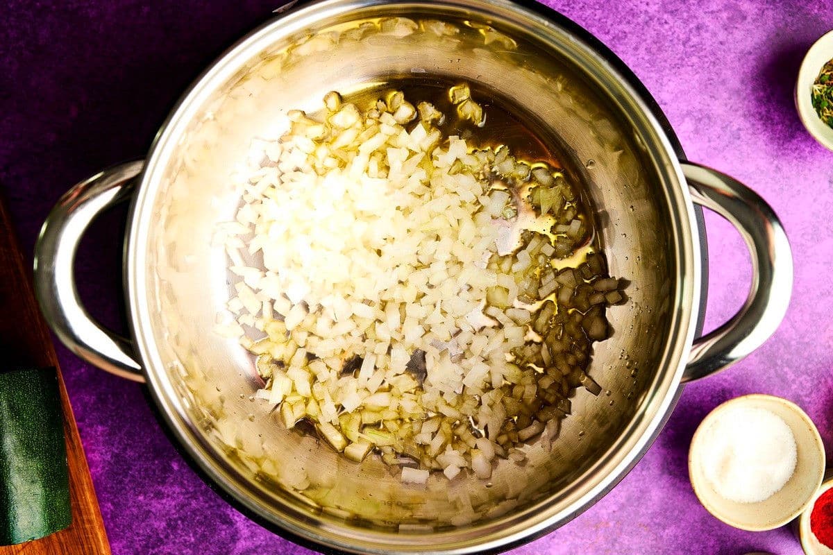 Diced onions in pot.