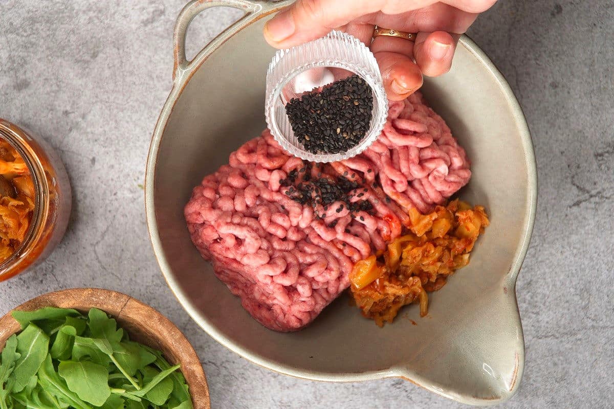 Ground beef and kimchi in bowl.