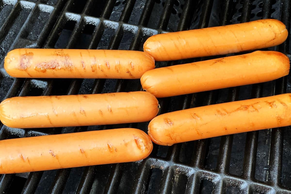 Wieners on the outdoor grill.