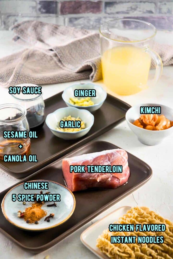 Kimchi ramen soup ingredients prepped and labeled.