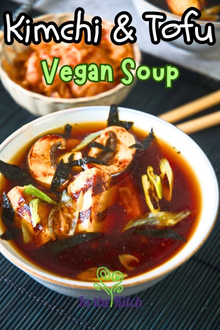 Kimchi tofu soup in bowl with text overlay that says 'kimchi & tofu vegan soup'.