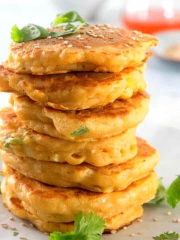 Kimchi pancakes stacked on top of each other.