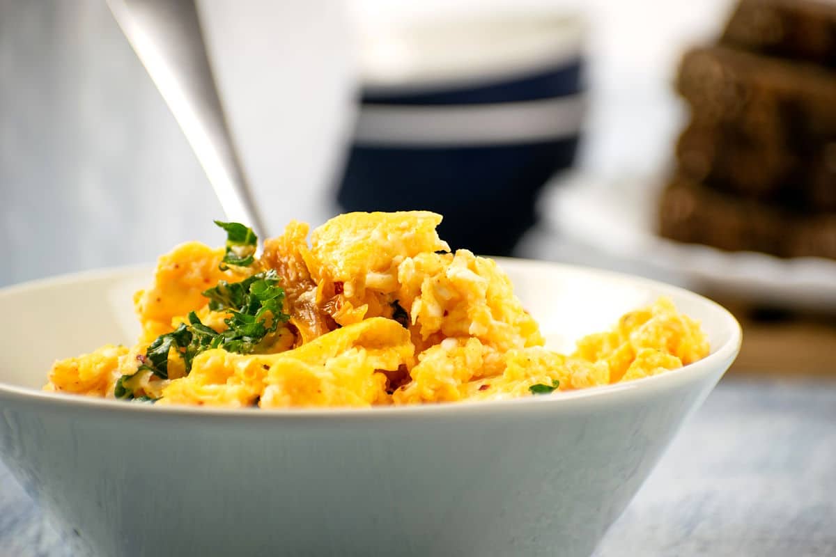 Korean kimchi scrambled eggs in bowl.