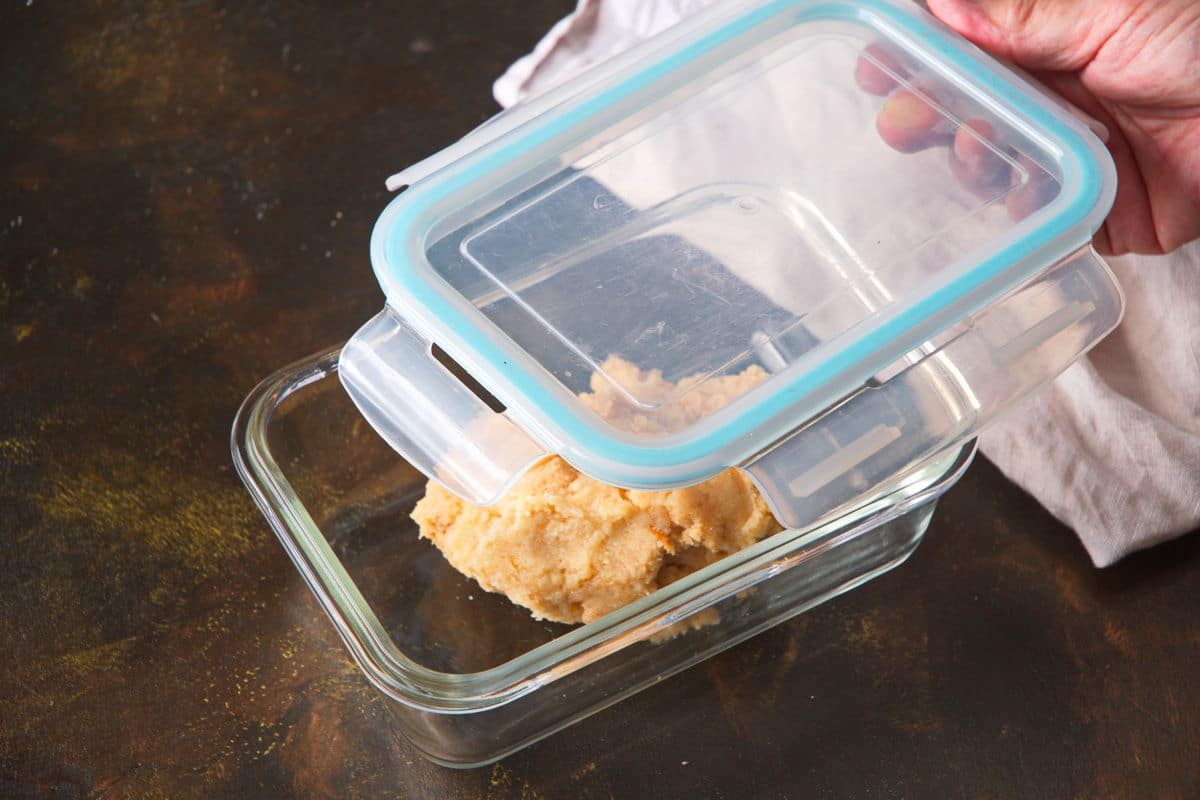 Leftover cake pop batter in airtight glass container with lid.