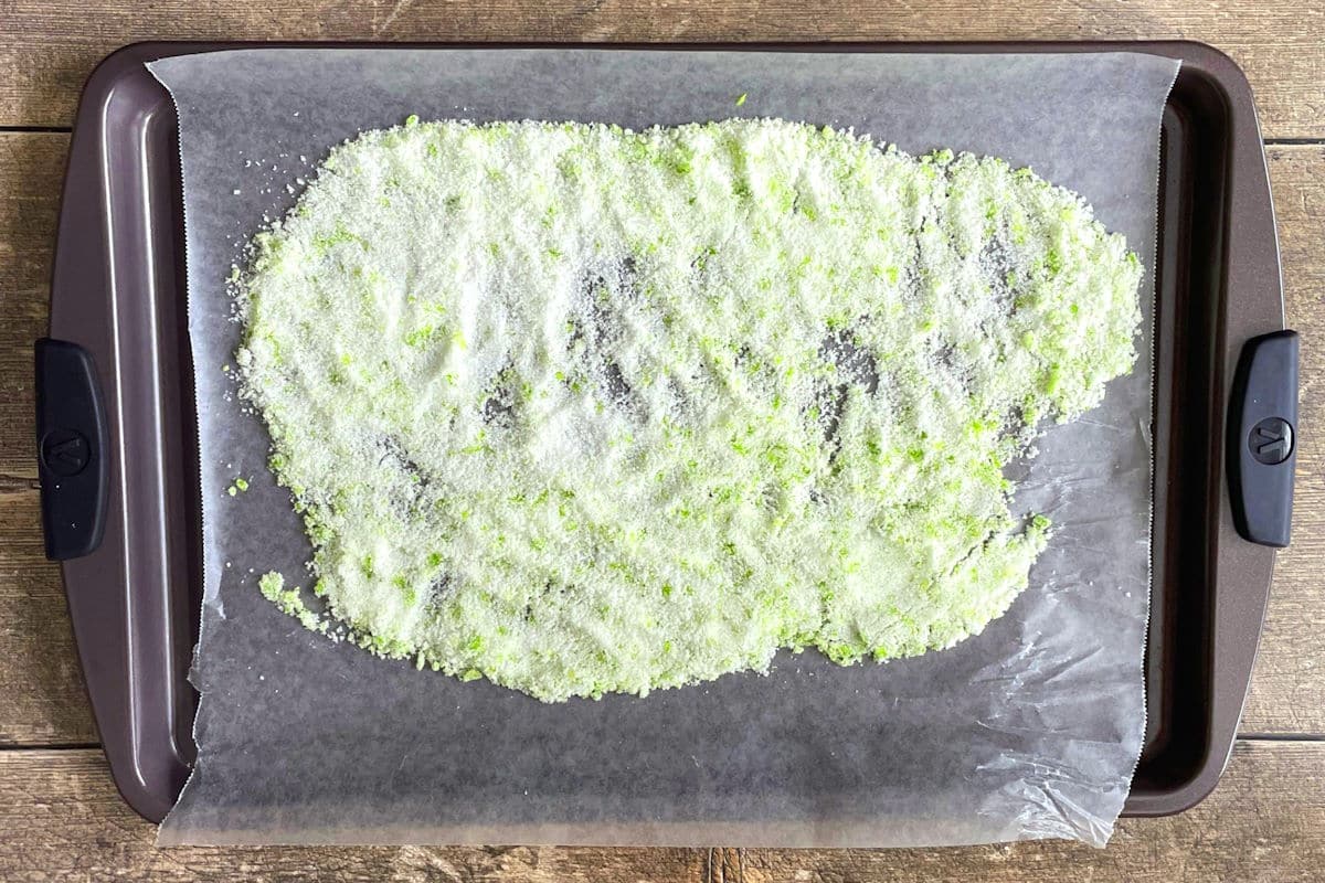 Lime sugar rim spread out on pan.