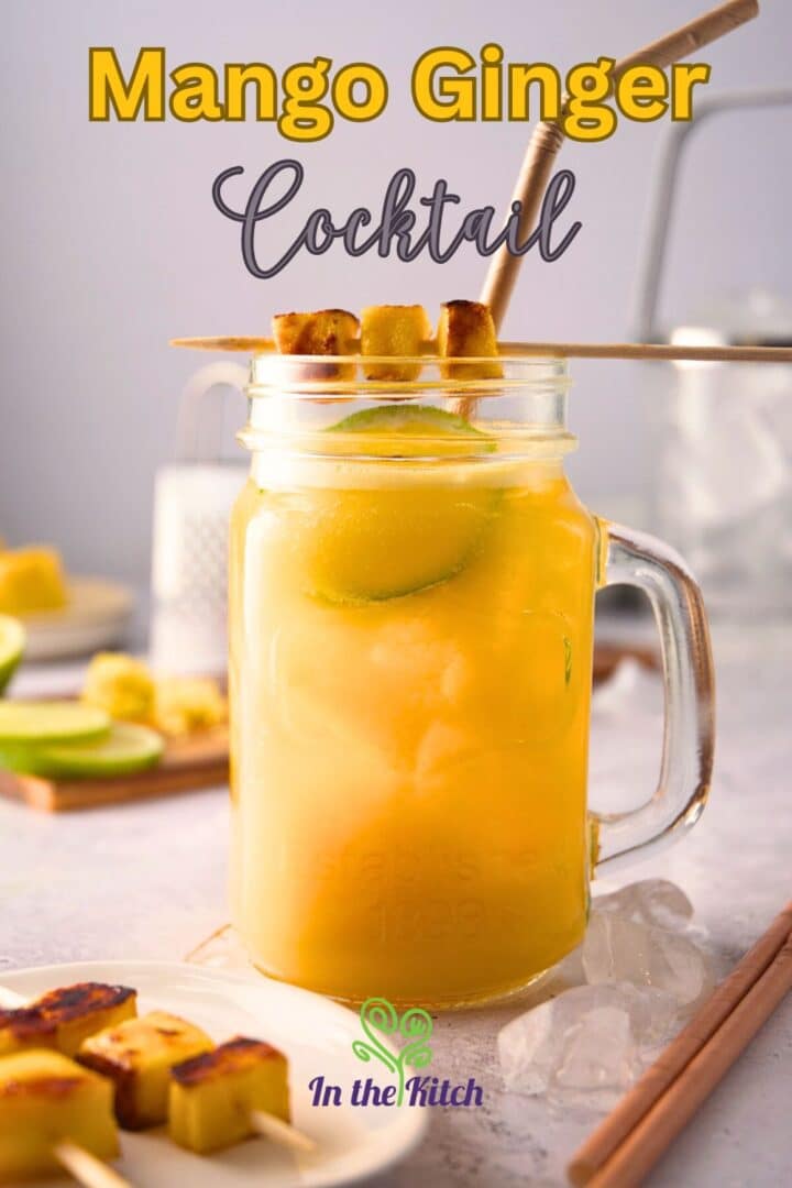 Mango ginger cocktail in glass with text overlay that says 'mango ginger cocktail'.