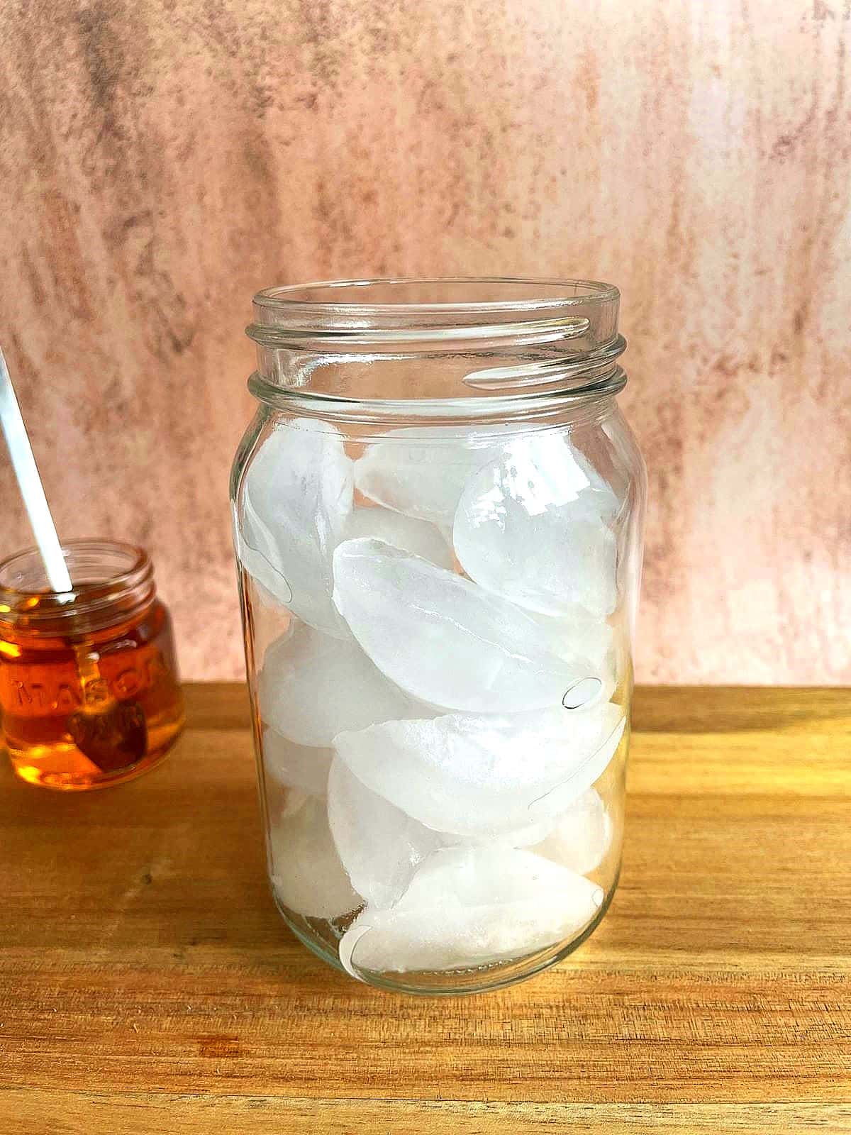 Glass filled with ice on board.