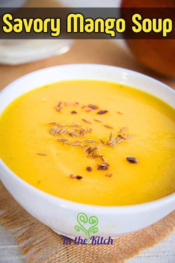Mango soup in bowl with text overlay that says 'savory mango soup'.
