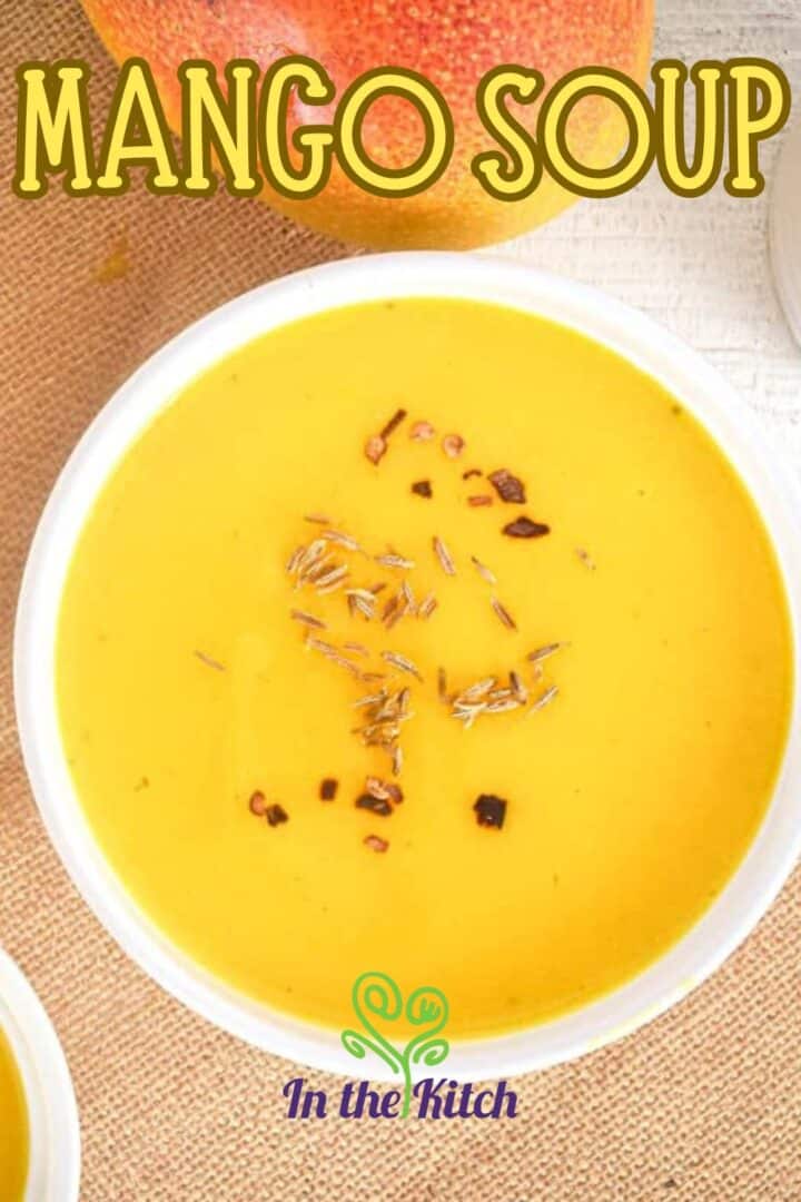 Mango soup in white bowl with text overlay that says 'Mango Soup'.