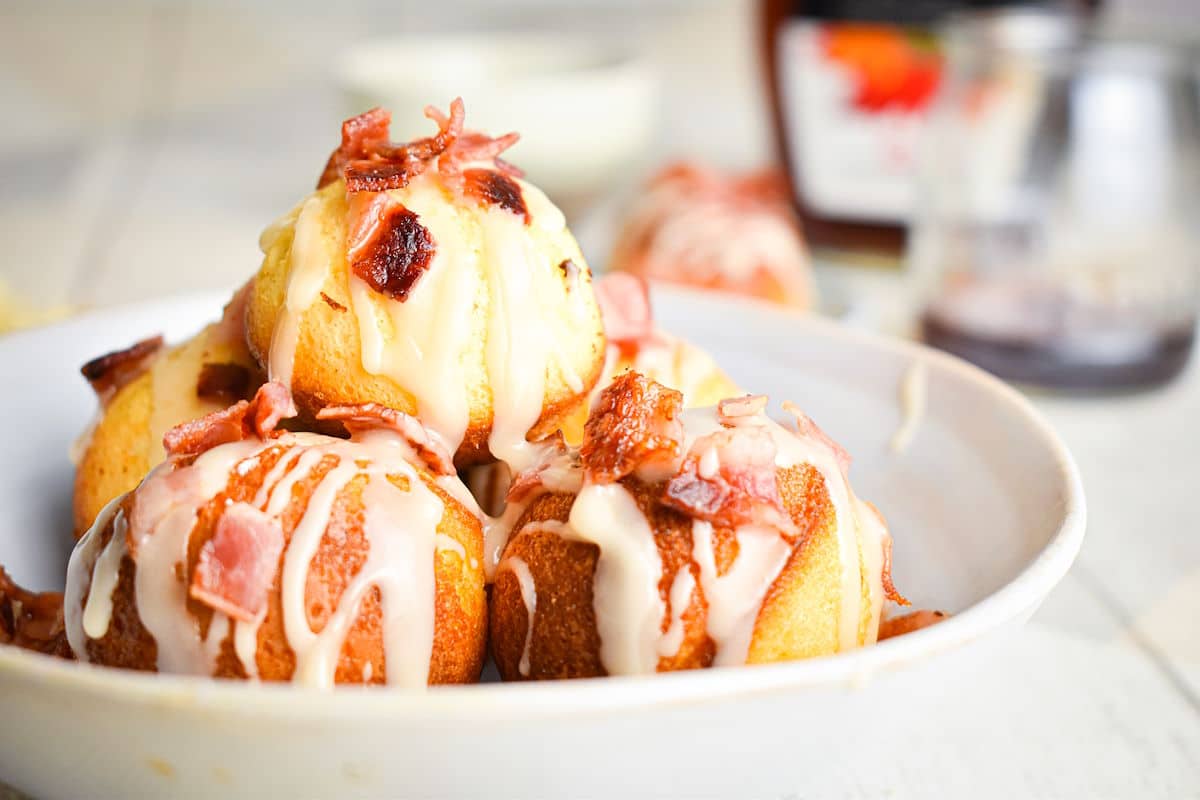 Maple bacon cake balls in bowl.