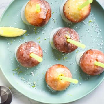 Margarita cake pops on plate.
