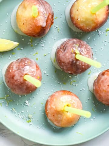 Margarita cake pops on plate.