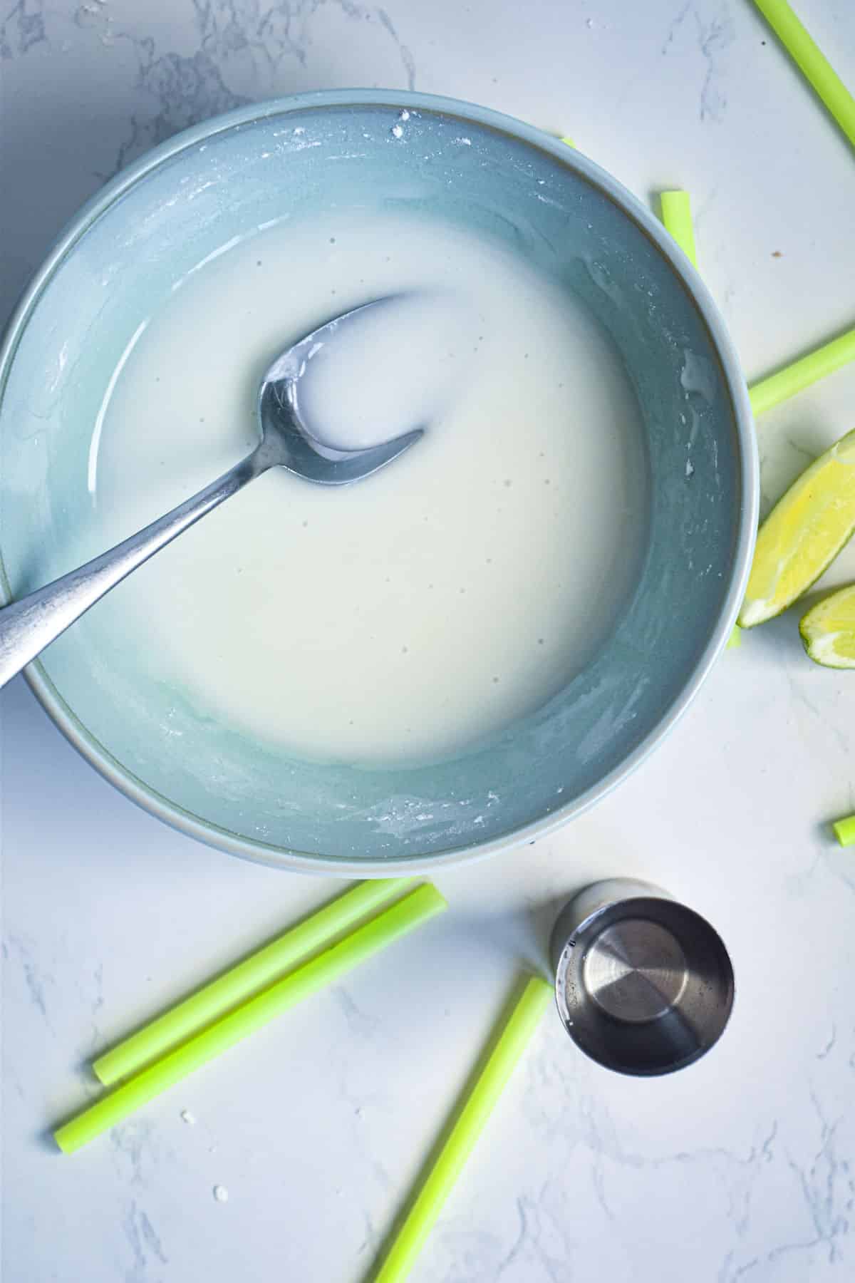 Glaze in bowl with spoon.
