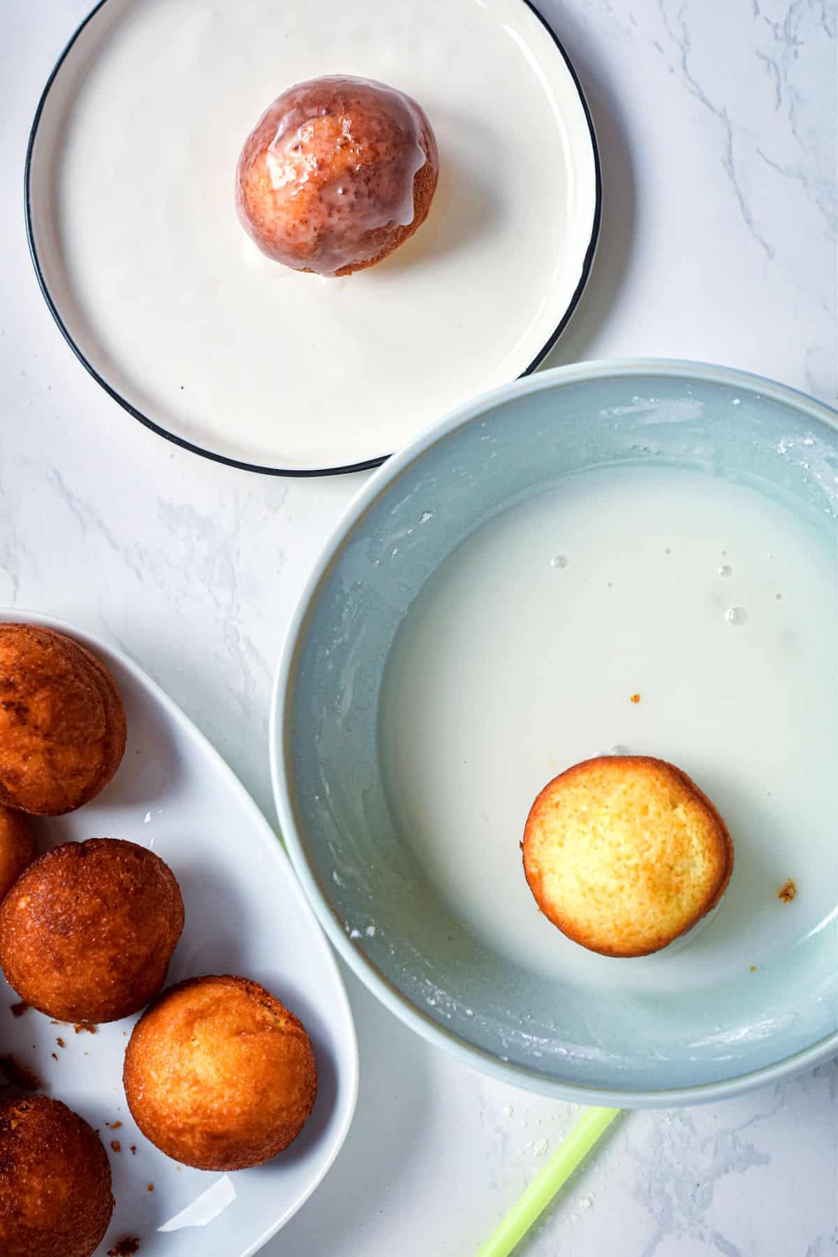 Margarita cake balls with glaze on plate.