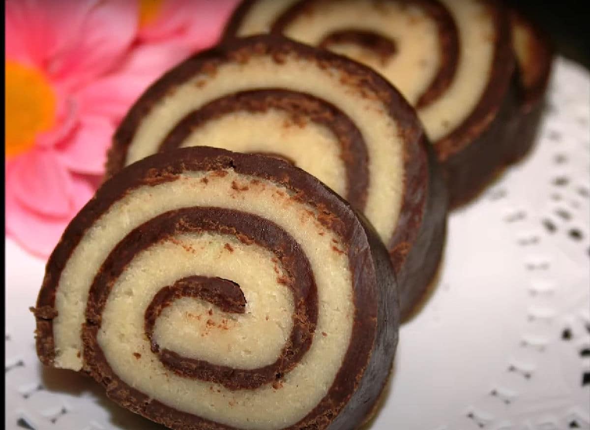 Marzipan fudge roll sliced.