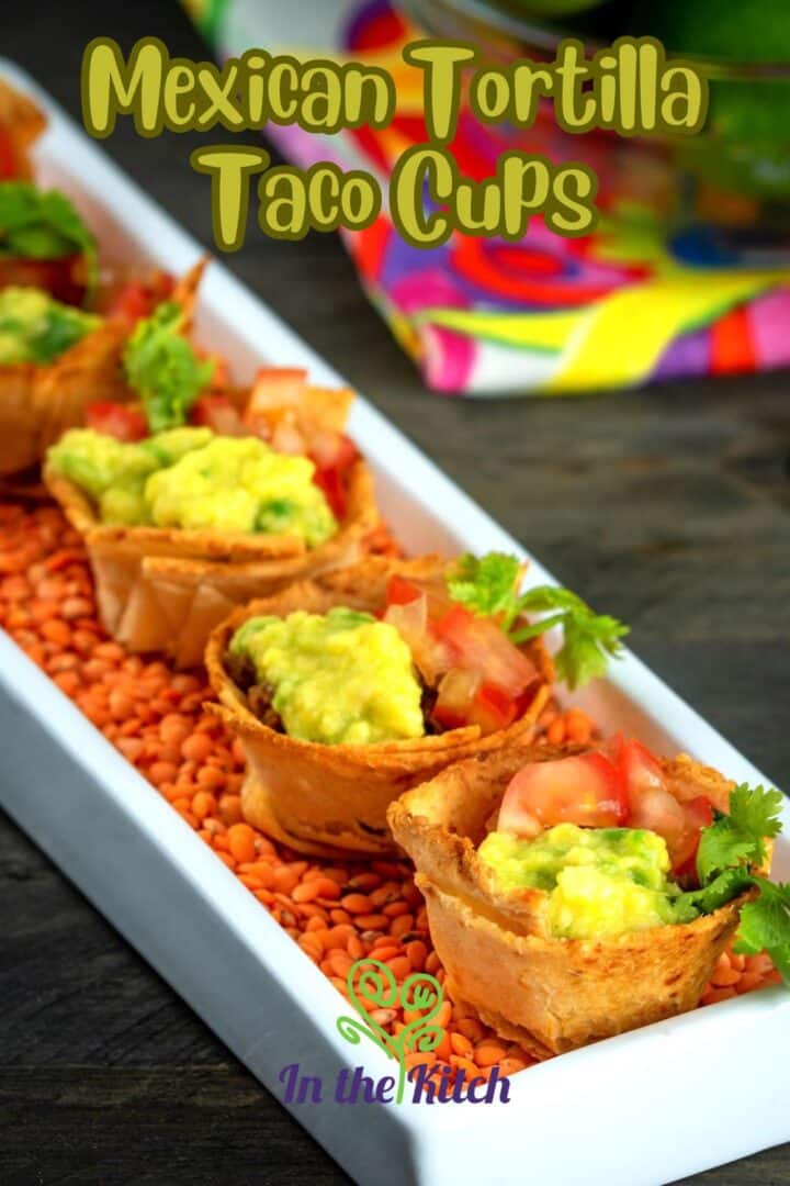 Mini taco cups in serving dish with text overlay that says 'Mexican tortilla taco cups'.