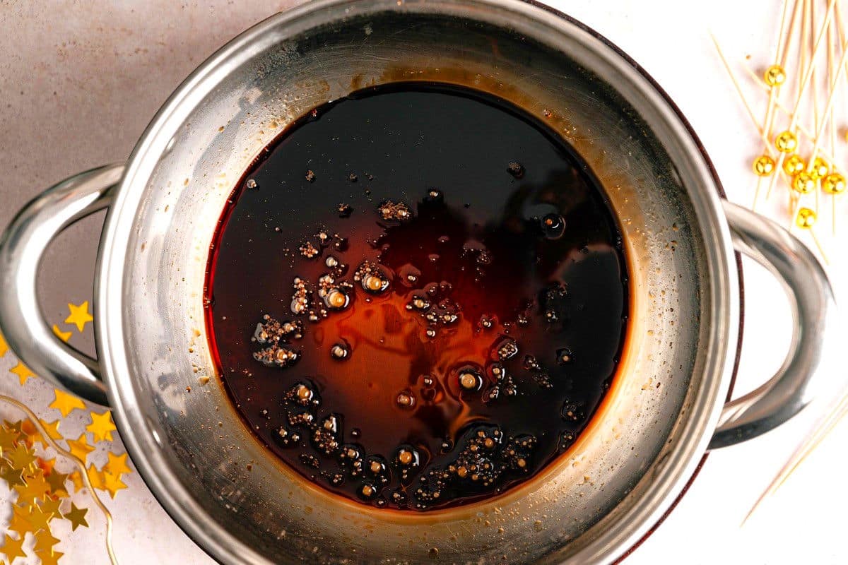 Balsamic reduction in saucepan.
