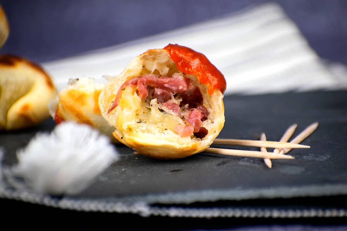 Mini pizza ball cut open.