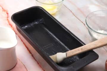 Loaf pan with grease.