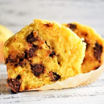 Orange chocolate chip muffin cut open.