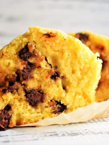 Orange chocolate chip muffin cut open.