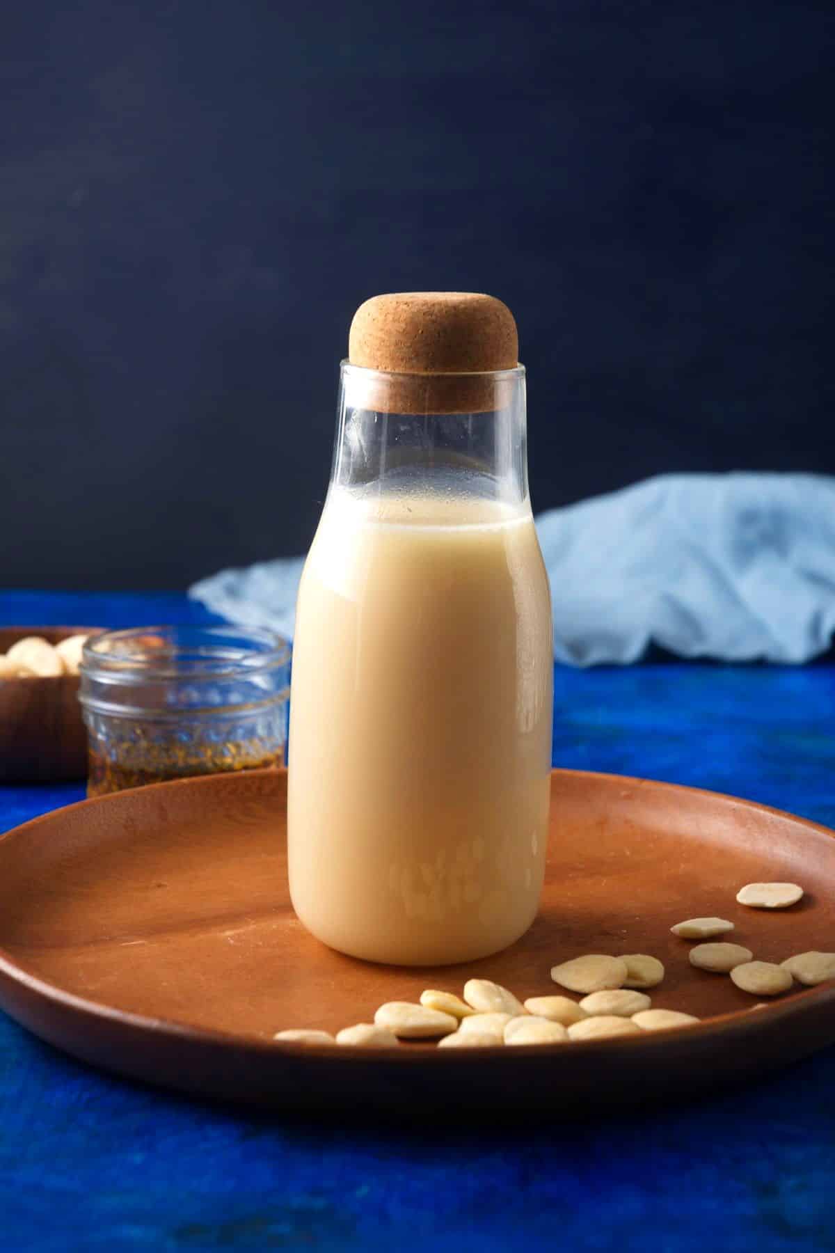 Orgeat almond syrup in jar with lid.