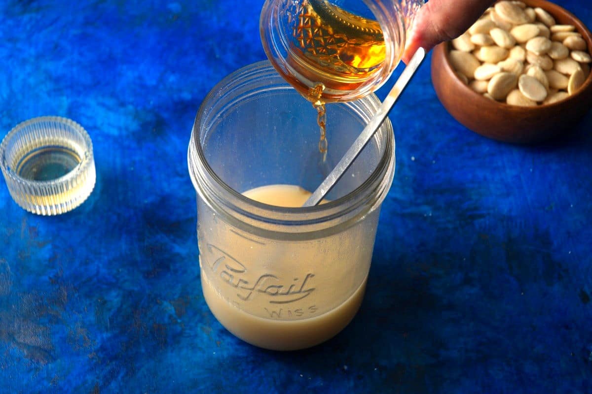 Orgeat in jar with brandy.