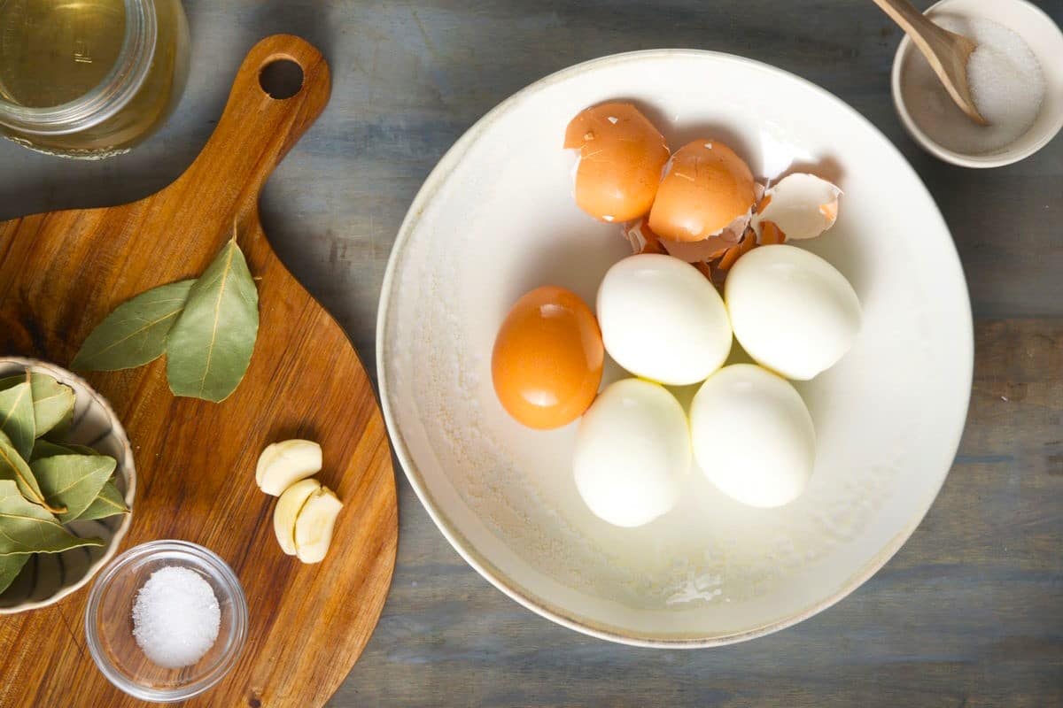 Shelled eggs on a plate.